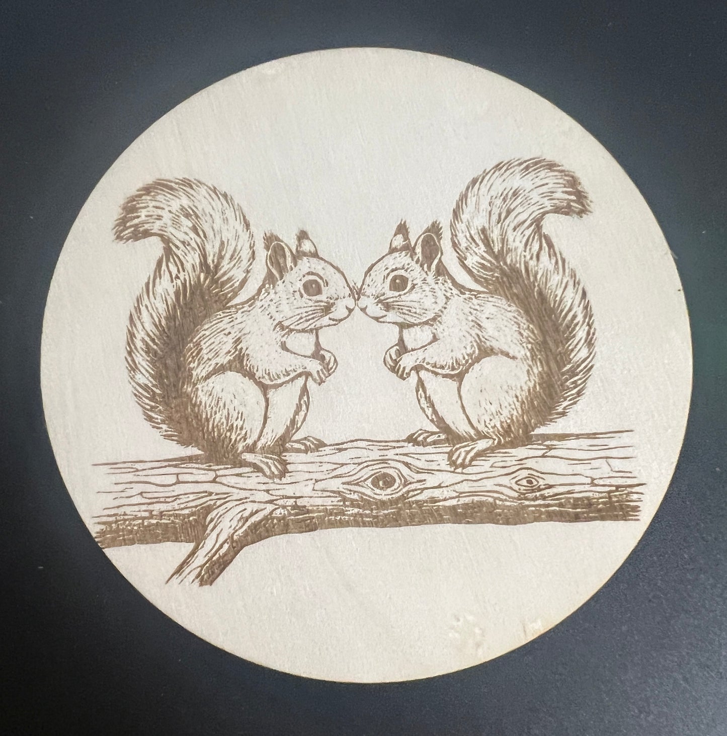 Wooden squirrel coaster
