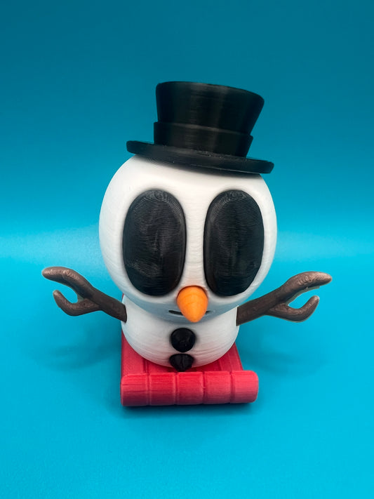 Blob snowman in top hat on sled!